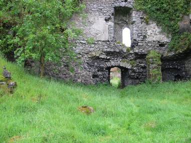 Templehouse Demesne ruins, Co. Sligo, with cross-base visible in foreground.