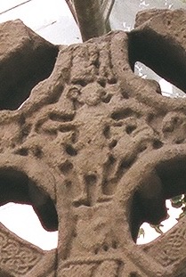 Kells Market Cross, head, lower panel.  David plays the harp or Samuel anointing David