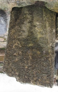 Tory Island Tower Cross, Co. Donegal, crucifixion showing legs of Jesus